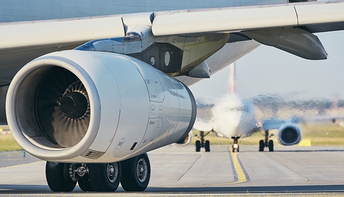 Airplane at airport runway Airplane at airport runway