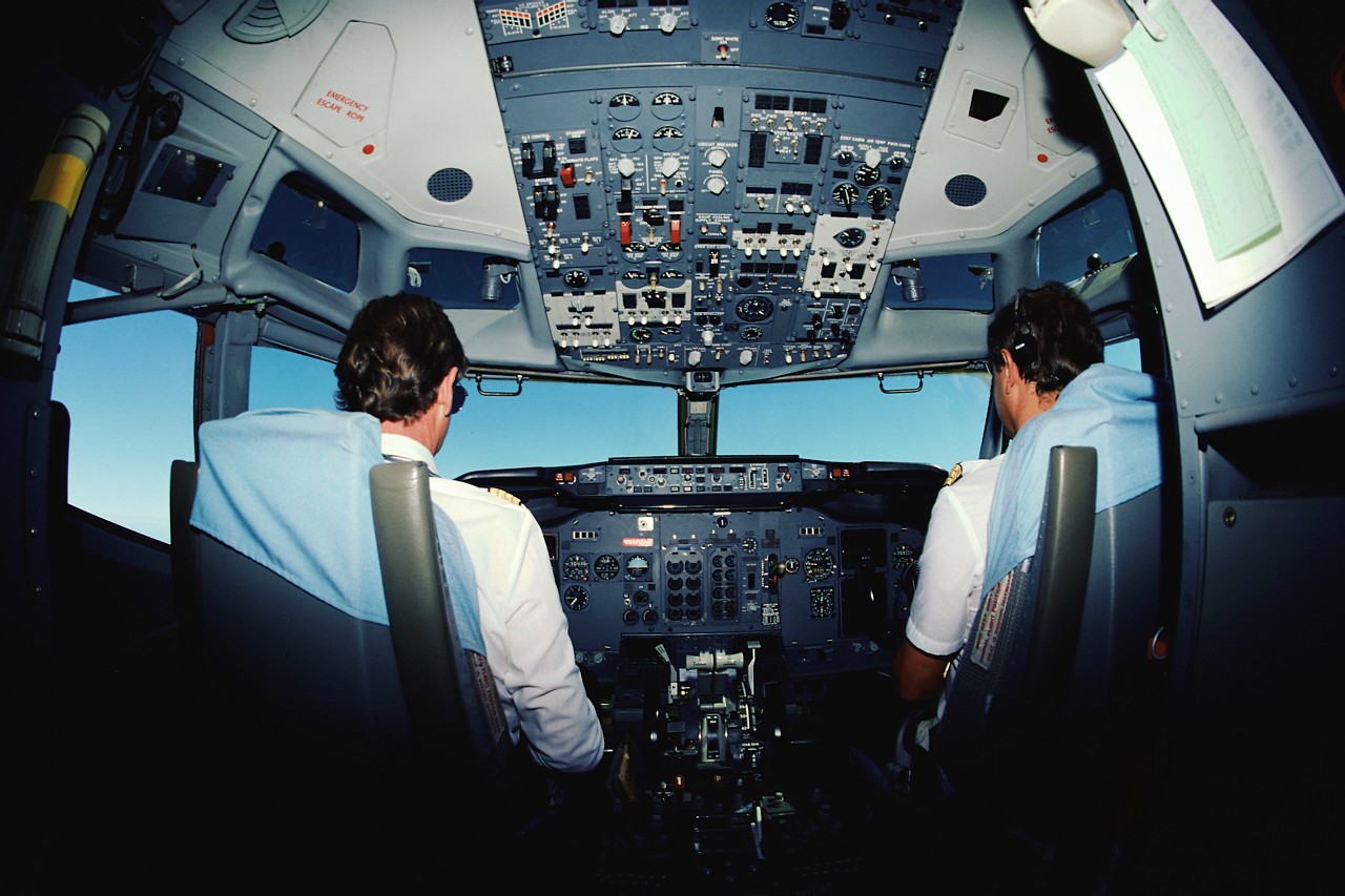 Pilots in cockpit can read aviation safety articles when they are standing by or waiting for their flights